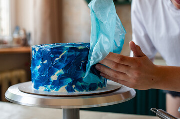 Young Woman Making The Cake