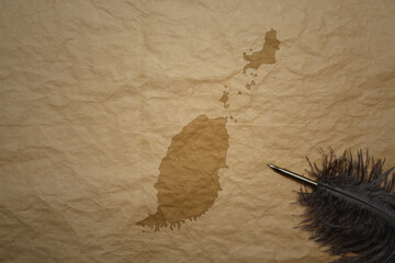 map of grenada on a old paper background with old pen