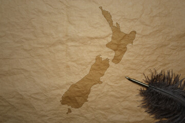map of new zealand on a old paper background with old pen