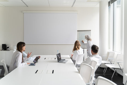 Medical Consultation Of Researchers In Bright Room
