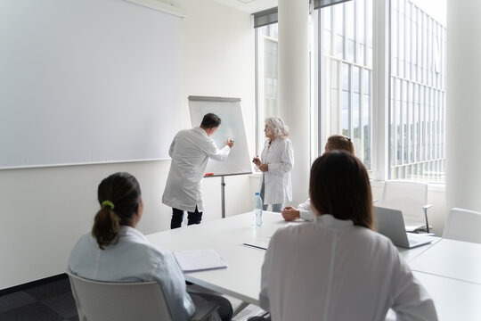 Medical Consultation In Modern Conference Room