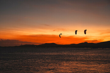 Magic orange sunset view.
A sunset is a natural phenomenon that occurs daily as the sun dips below the horizon, marking the end of daylight hours. It is a breathtaking and often picturesque event 