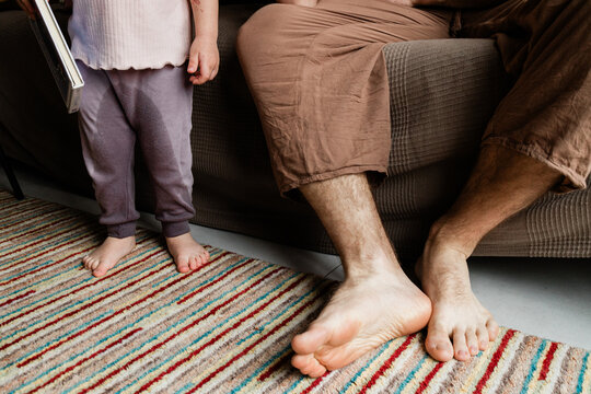 Father and toddler in real moment