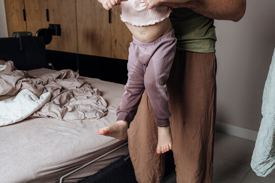 Father and toddler in real moment