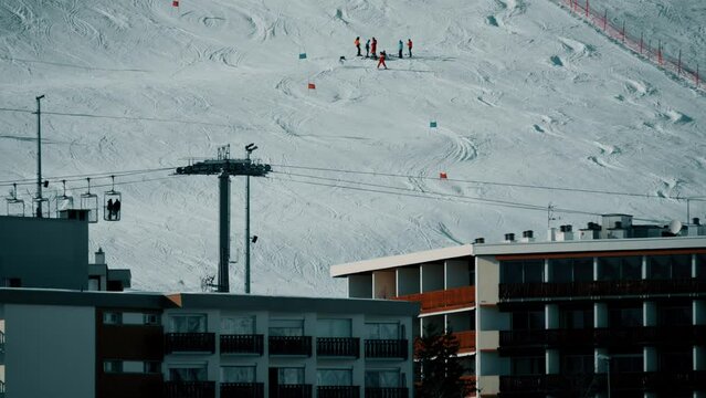 Alpine hotels and skiing slopes in Alpe d'Huez ski resort, France