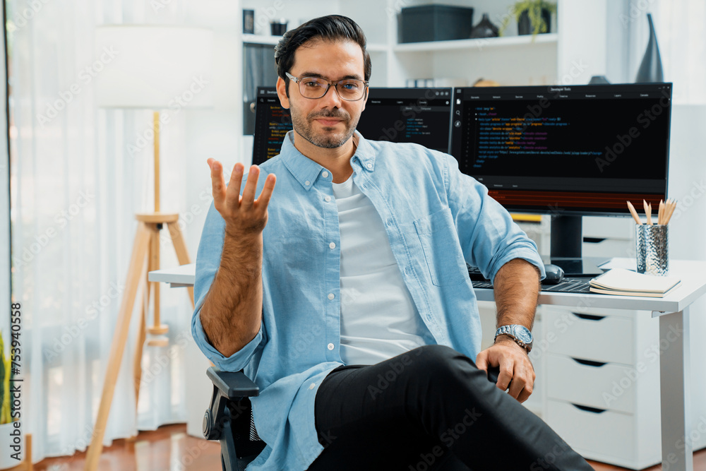 Wall mural profile's smart it developer looking camera to pose wearing glasses against on software development 