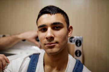 Portrait of a worker in overalls