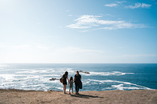Women with girl on amazing shoreline