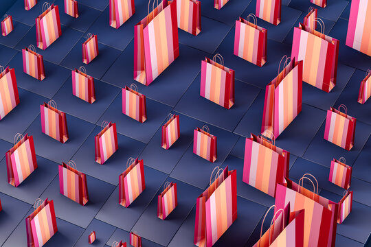A row of colorful bags sitting on top of a table