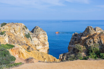 Fototapeta na wymiar Beautiful view of the cliffs and the Atlantic ocean at Ponta da Piedade in Lagos, Portugal