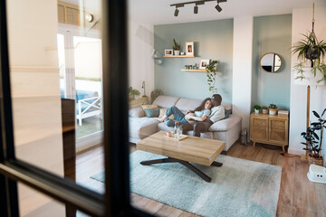 Pregnant couple at home