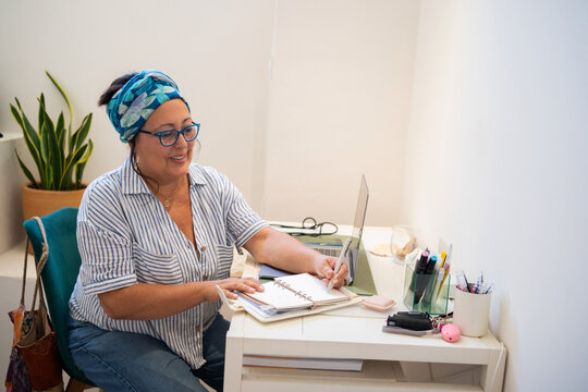 mature Plus-Size Woman Working on Home Business