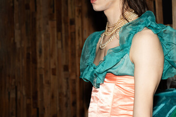 Androgynous latin man at costume party