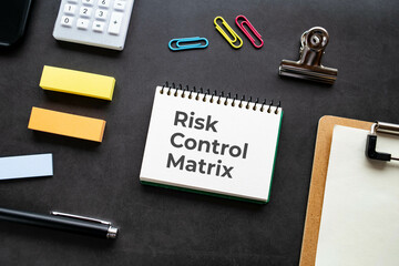 There is notebook with the word Risk Control Matrix. It is as an eye-catching image.