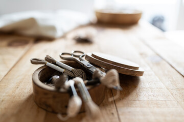 Knitting and embroidery tools.