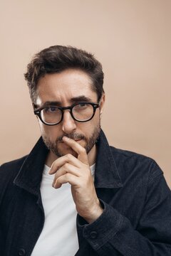 Studio headshot of middle age man with facial expression