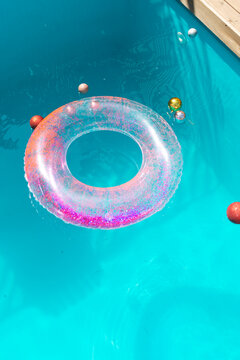 Inflatable circle and baubles in swimming pool