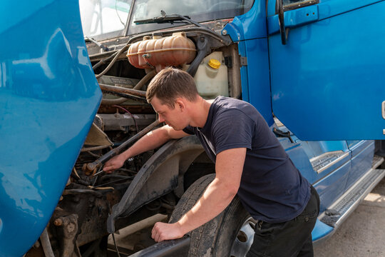 Mechanic Checking truck cabin