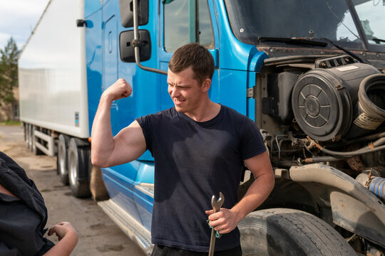 Truck driver shows musculs