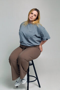 Young woman sitting on chair
