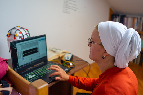 Muslim Student Studying on her Laptop
