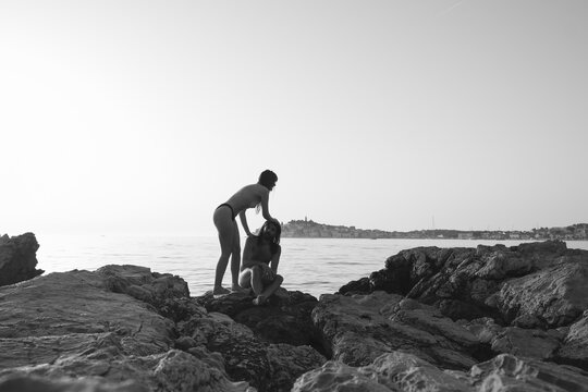 Couple on a rocky beach