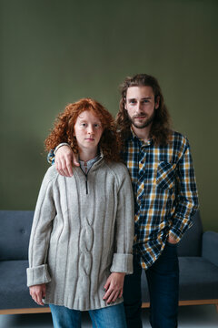 Portrait of young adult higging people.