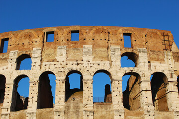 Colosseum with blue sky in Rome, Italy