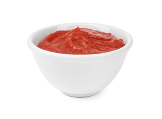 Organic ketchup in bowl isolated on white. Tomato sauce