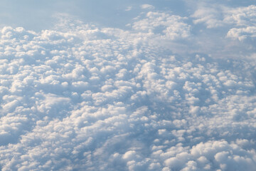 Above the clouds up in the air