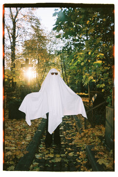 Cute ghost posing at the cemetery