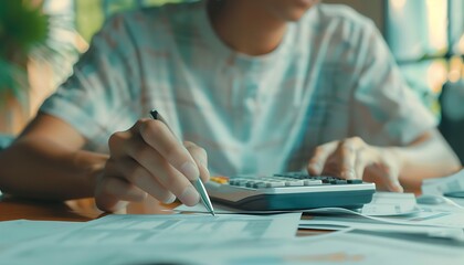 a man calculates taxes using a calculator, bankrupt, loss - obrazy, fototapety, plakaty