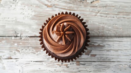 chocolate cupcake with chocolate butter cream swirl on white wooden background, - obrazy, fototapety, plakaty