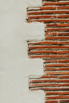 Brick and plaster detail on an old building
