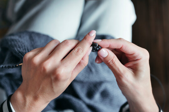 Hands of knitting female.