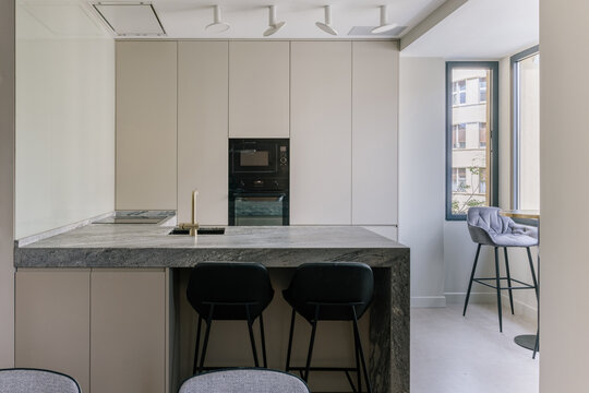 Open plan kitchen inside modern design apartment