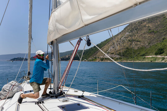 Sailor working on the yacht bow