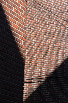 Curious light on the brick building