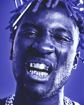 Portrait of a young African American man crying