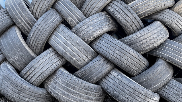 Stacked car tyres