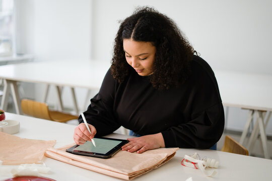 Designer Working On A Tablet