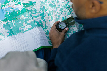 The man studies the map