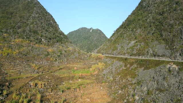 Aerial view of picturesque mountain landscape on the Ha Giang loop route, Vietnam.