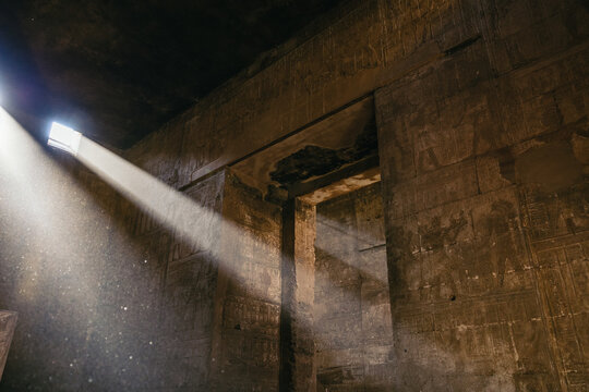 Rays of light illuminating the interior of the Egyptian temple of Edfu