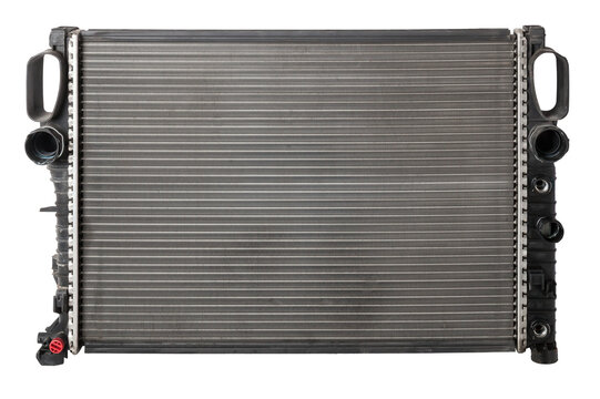 Car cooling radiator isolated on white background. Spare cooling system of internal combustion engine