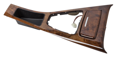 Wooden lining of a car gearbox selector on a white isolated background.