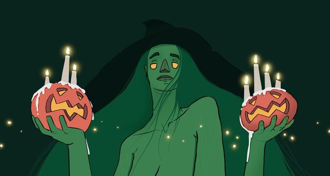 Portrait of a green witch with big black hat holding pumpkins