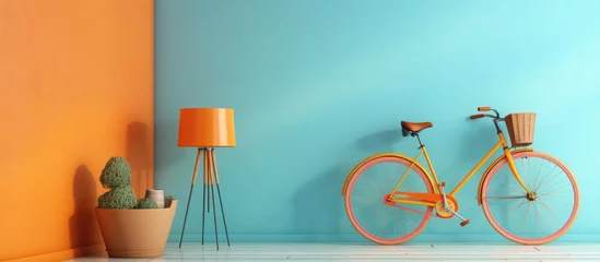 Foto op Canvas A bright yellow bicycle is parked neatly next to a modern blue wall in a room interior. The contrast of colors creates a striking visual impact in the scene. © Vusal