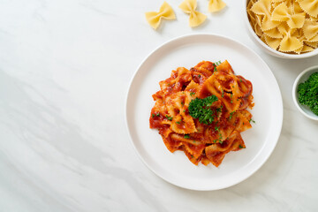 farfalle pasta in tomato sauce with parsley