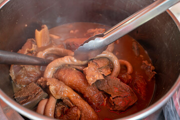 Delicious beef offal in a pot